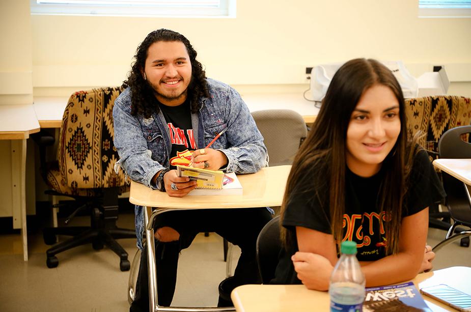 two students in a classroom